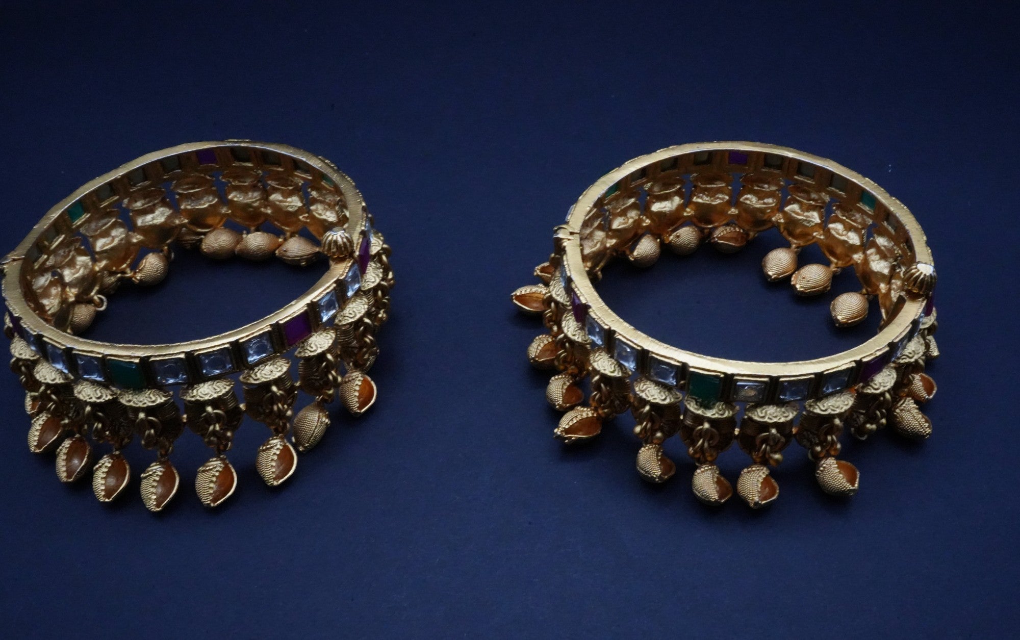 Antique Gold-Plated Kundan Bangles with Charms