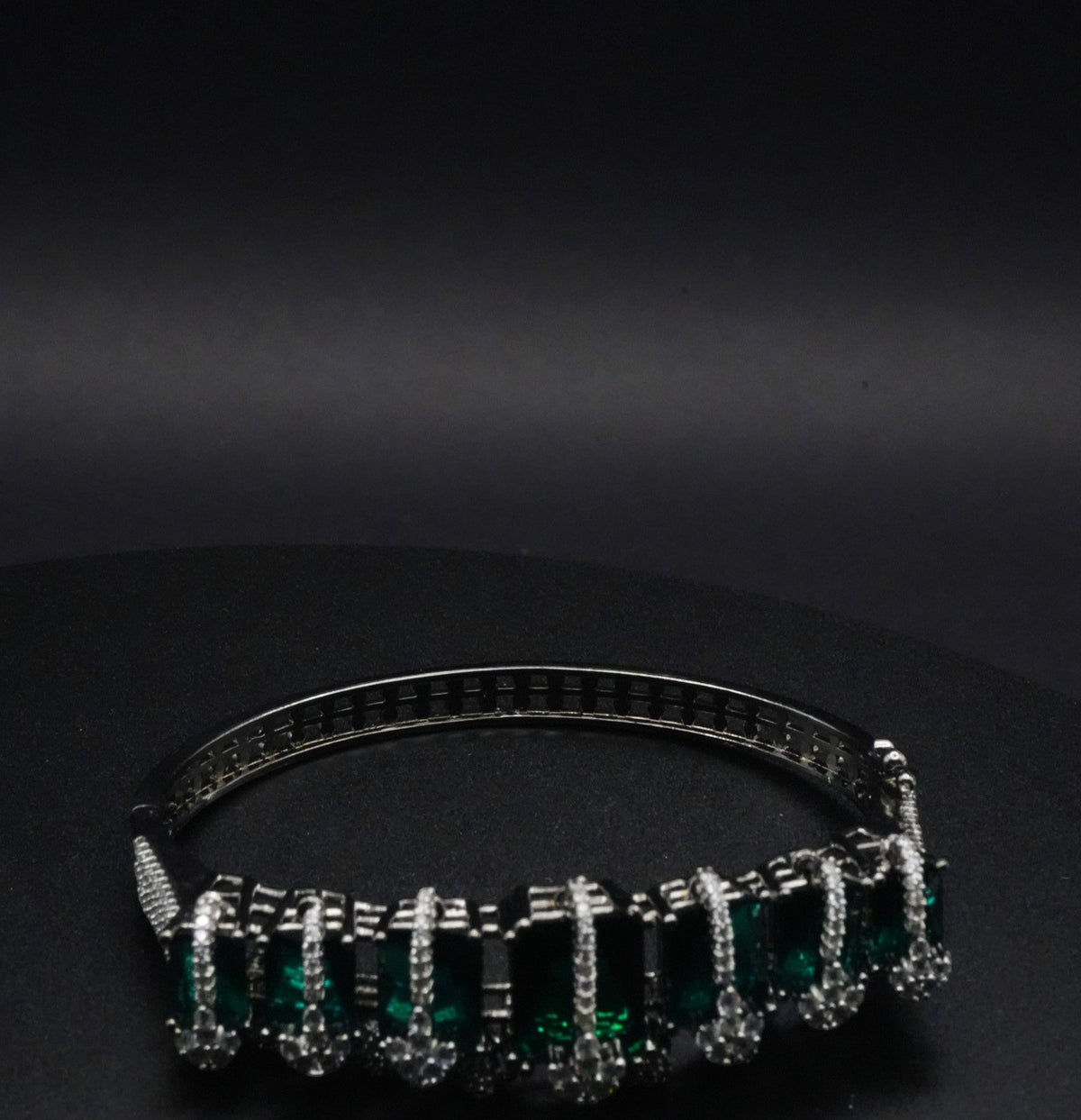 Luxurious Silver coated Bangle with Emerald Green Gemstones with CZ Crystals