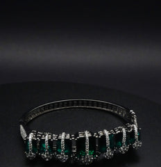 Luxurious Silver coated Bangle with Emerald Green Gemstones with CZ Crystals