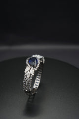 Sapphire Sparkle: Zircon-Accented Bangle Bracelet