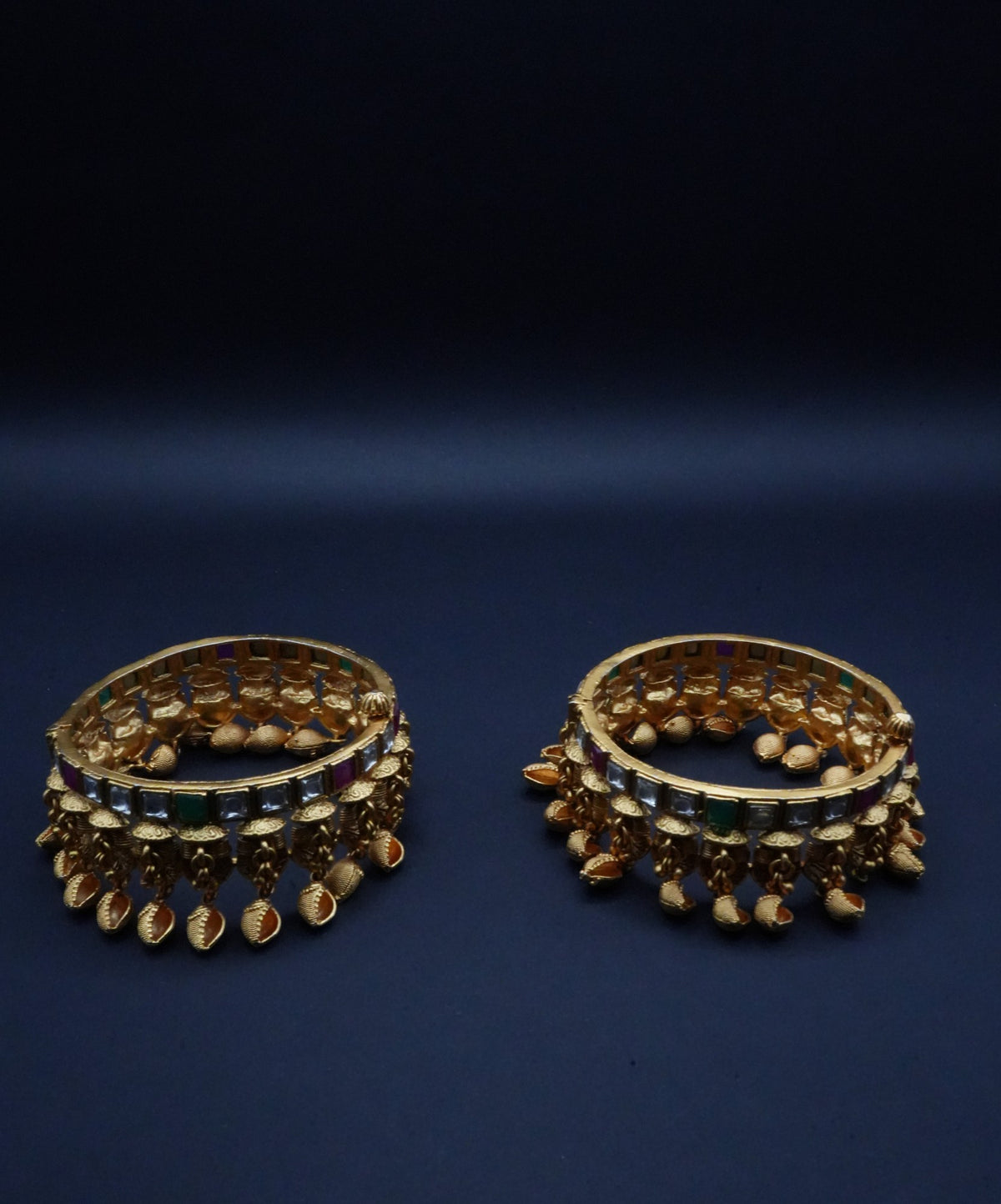 Antique Gold-Plated Kundan Bangles with Charms